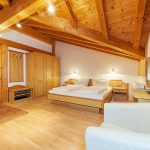 Appartement Giebelstueberl - Wohnbereich mit Komfortbett