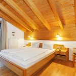 Ferienwohnung Kaiserblick - Schlafzimmer mit Komfortbett
